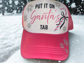 “PUT IT ON Santa’s TAB” trucker hat